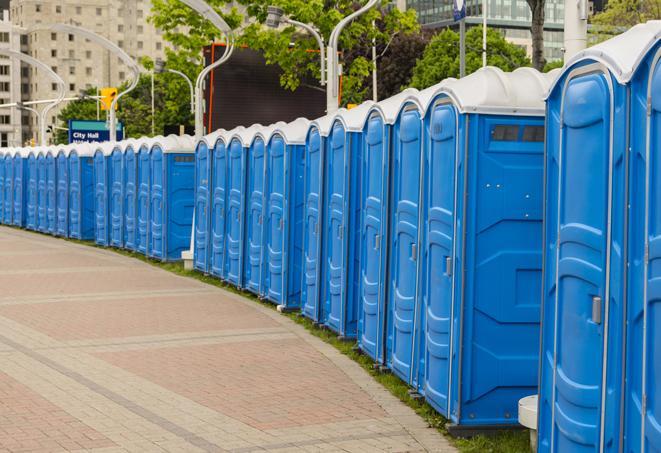 a row of portable restrooms at a fairground, offering visitors a clean and hassle-free experience in addison